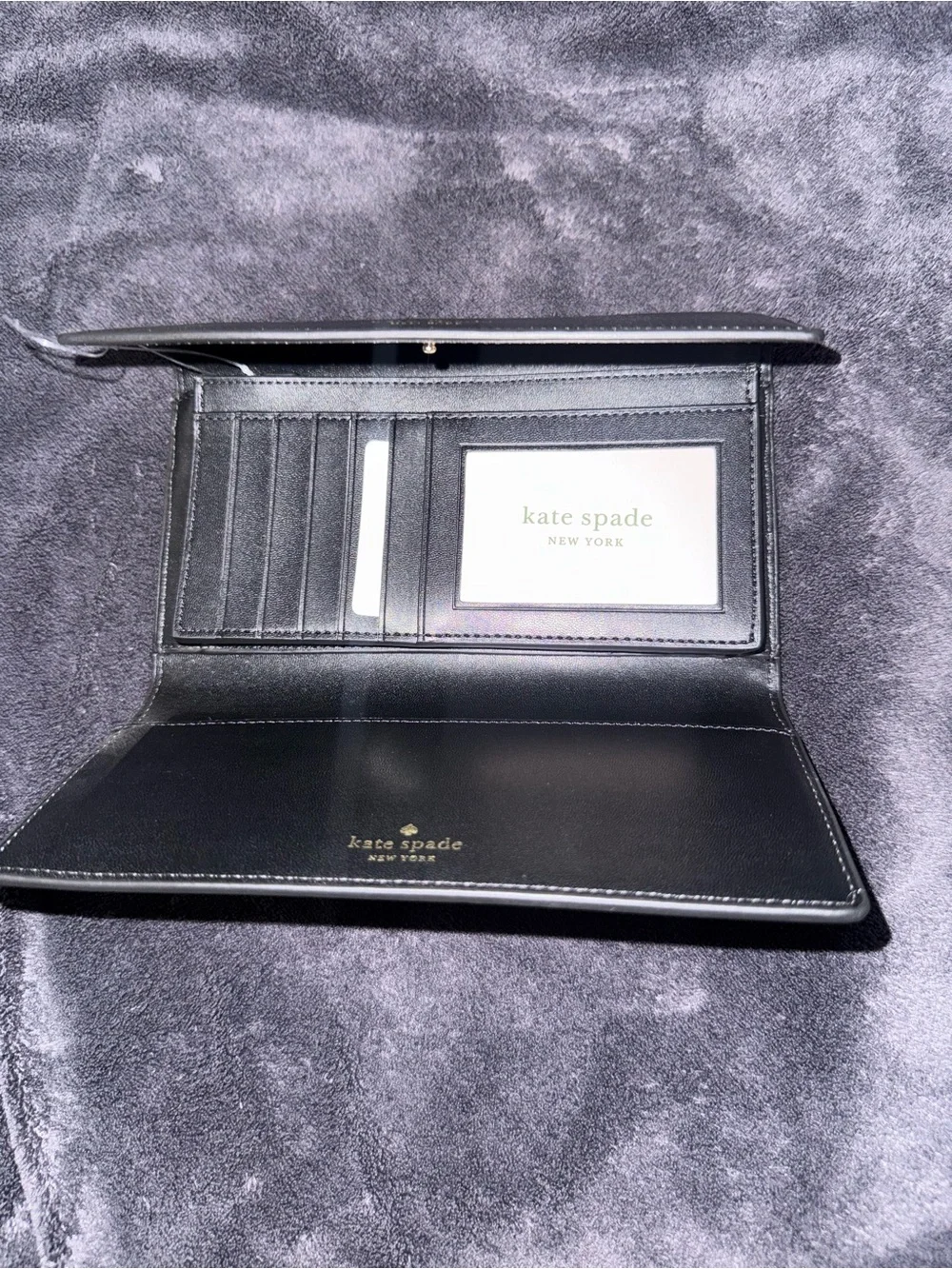 kate spade black pebbled leather continental clutch wallet with gold logo
